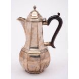 A Victorian silver coffee pot, maker George Aldwinckle, London 1894: of octagonal baluster form,