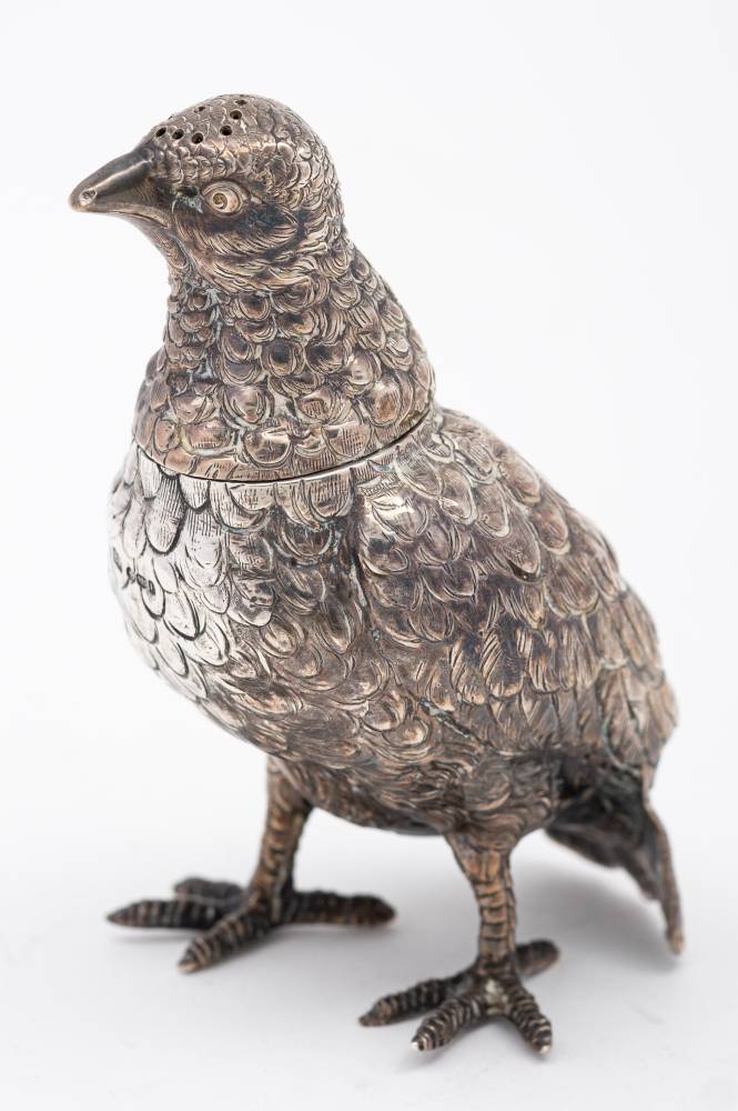 A George V silver novelty pepperette, maker Berthold Muller, bears import marks for London,