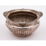 A Victorian silver sugar bowl, maker Walter & John Barnard, London, 1895: of circular outline,