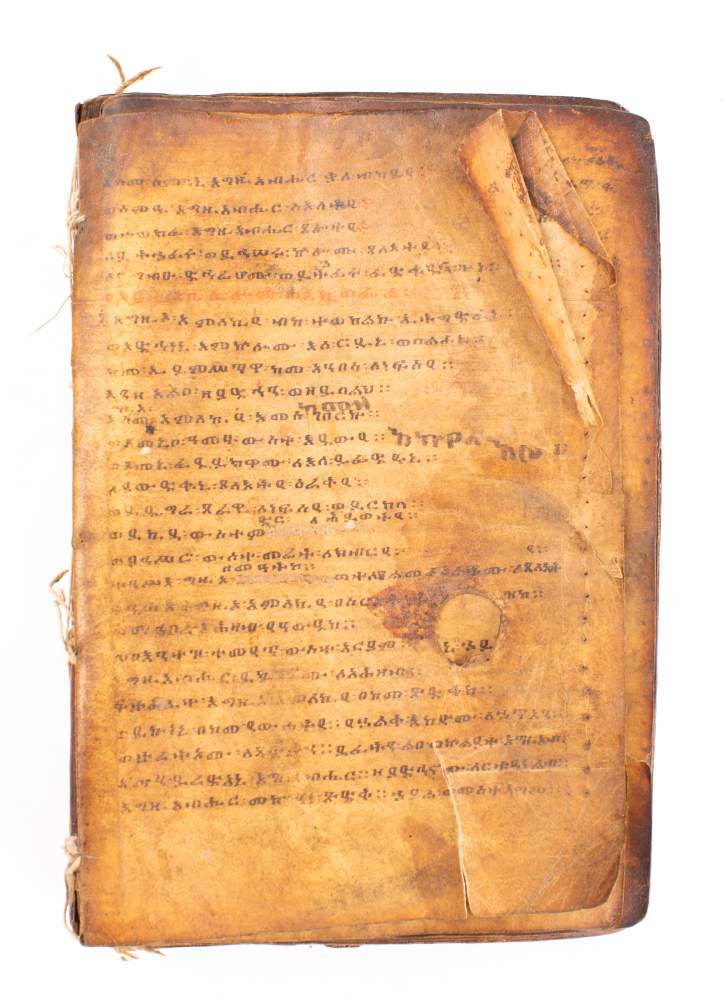 HOLY BOOK : hand written in a Coptic script, on heavily stained vellum, - Image 3 of 4