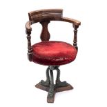 An Edwardian stained beech ship's swivel open armchair by A Blain & Son, Liverpool,