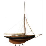 An Edwardian 1/12th scale model of the 10-ton Bristol Channel One Design class 'Coquette': standing