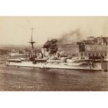 A framed photograph of HMS 'Warspite' and another of HMS/m 'Alaric': 16x22.5cm and 16.5x27.