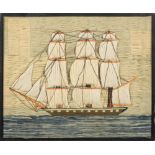 A late 19th century woolwork of a clipper ship: fully rigged over black hull with white ports,