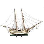 A scale model of a Baltic trader: running rigged over deck with wheelhouse, winch and fitting,