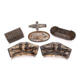 A tin two-section pie mould: decorated with two birds and a collection of pastry cutters, etc.