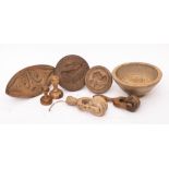Two treen butter rollers:, a circular butter mould with urn and floral stem, 16cm diameter,