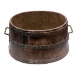 A late 19th Century iron coopered twin-handled milk settler: of oval shape and large size,