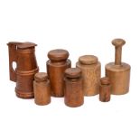 Six various turned wood pie moulds: and a small wood lidded jug of tapering form, 23cm high.