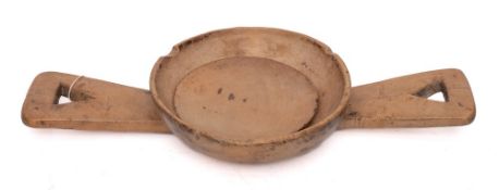 A sycamore twin-handled cheese strainer: with press,