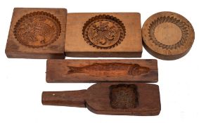 A rectangular handled treen butter mould: with flowerhead decoration, 29.