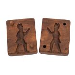 An 18th Century two section chocolate mould: decorated with a figure of a soldier, 10 x 8cm,