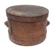 A circular drum-shaped twin-handled wood butter churn and cover:, 38cm diameter.