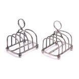 A pair of George V silver four-division toast racks, maker Carrington & Co, London,