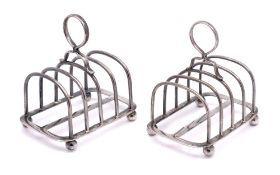 A pair of George V silver four-division toast racks, maker Carrington & Co, London,
