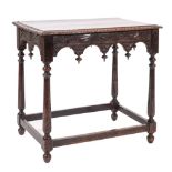 A carved oak side table in Jacobean style, late 19th century,