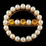 A 9 carat gold yellow sapphire and cultured pearl brooch,