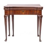 A George II mahogany combined tea and card table, mid 18th century,