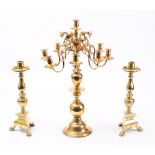 A large brass eight branch candelabrum: in the Dutch style,
