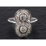 A round, brilliant and single-cut diamond ring in a figure of eight design,