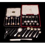 A mixed lot of silver flat wares, various makers and dates: includes sugar nips, tongs,