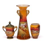 Three Royal Doulton vases: one of two handled tapering cylinder form with flaring rim,
