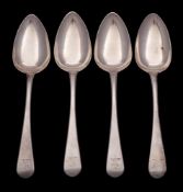 A set of four George III silver Old English pattern table spoons,