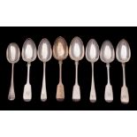 Five assorted silver Fiddle pattern dessert spoons, various makers and dates: three initialled,