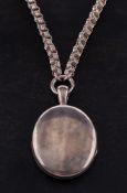 An oval locket pendant with hairwork on a fancy-link chain,: length of locket (inc. bale), ca.