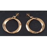A pair of 9ct gold, flattened hoop earrings,: hallmarks for Sheffield,