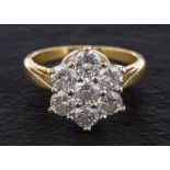 An 18ct gold, round, brilliant-cut diamond cluster ring,: total estimated diamond weight ca. 1.
