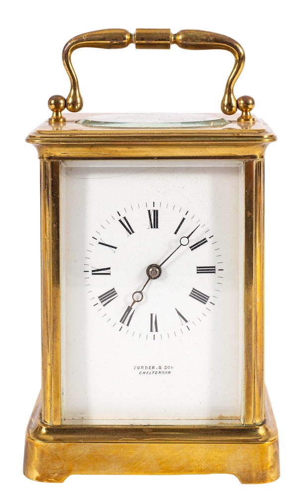 A Victorian French brass carriage clock: the eight-day duration movement having a platform cylinder
