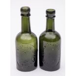 Two late 19th/early 20th century green glass wine bottles: for 'Ross & Co., Newton Abbot/Weston S.