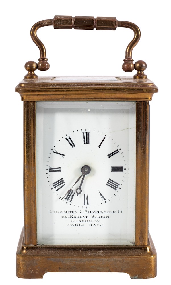 A small French Edwardian brass carriage clock: the eight-day duration timepiece movement having a