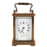 A small French Edwardian brass carriage clock: the eight-day duration timepiece movement having a