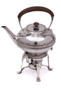 A George V hammered silver tea kettle, stand and burner, maker Liberty & Co.
