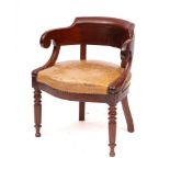 A 'Regency Empire' mahogany and leather upholstered desk chair, early 19th century,: of tub form,