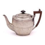 A late Victorian silver teapot, maker Atkin Brothers, Sheffield, 1891: crested,