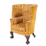 A carved mahogany and Damask upholstered barrel back armchair in George III style, 19th century,