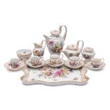 A Meissen [outside decorated] coffee service and tray in the Empire style: with 'swan' handles,