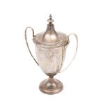 A George VI silver twin handled trophy cup and cover, maker Adie Brothers Ltd,