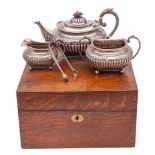A late Victorian silver three-piece tea set, maker James Dixon & Sons Ltd, Sheffield,