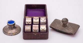 A mixed lot of silver and plated wares: includes a silver and enamel capstan inkwell, 7.