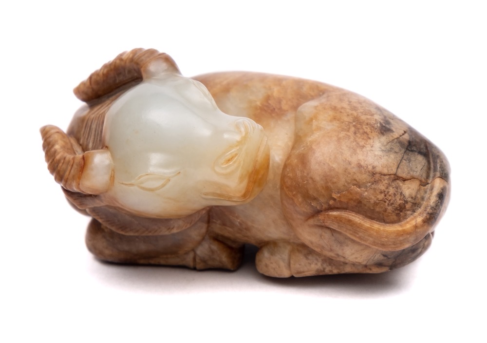 A Chinese jade carving of a water buffalo: the stone of mottled celadon, russet and grey colour, - Image 2 of 2