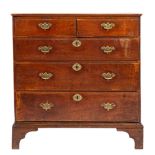 A George III oak chest of drawers, circa 1770,