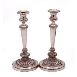 A pair of George III silver plated candlesticks,