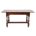An oak trestle table in 17th century style, late 19th / early 20th century,