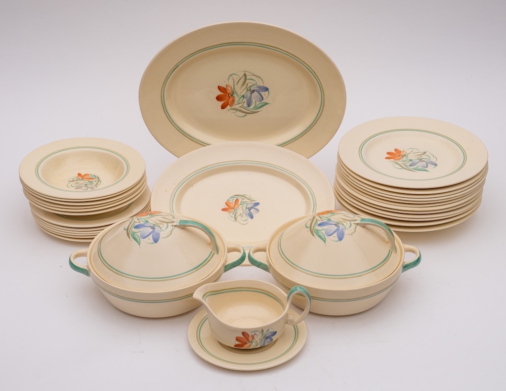 A Susie Cooper earthenware dinner service: decorated in a version of the April pattern,