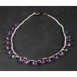 A seed pearl fringe necklace with briolette-cut amethyst pendants,: total length ca. 40cm.
