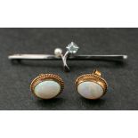A pair of opal ear studs and an aquamarine and cultured pearl bar brooch,: the 9ct gold, oval,